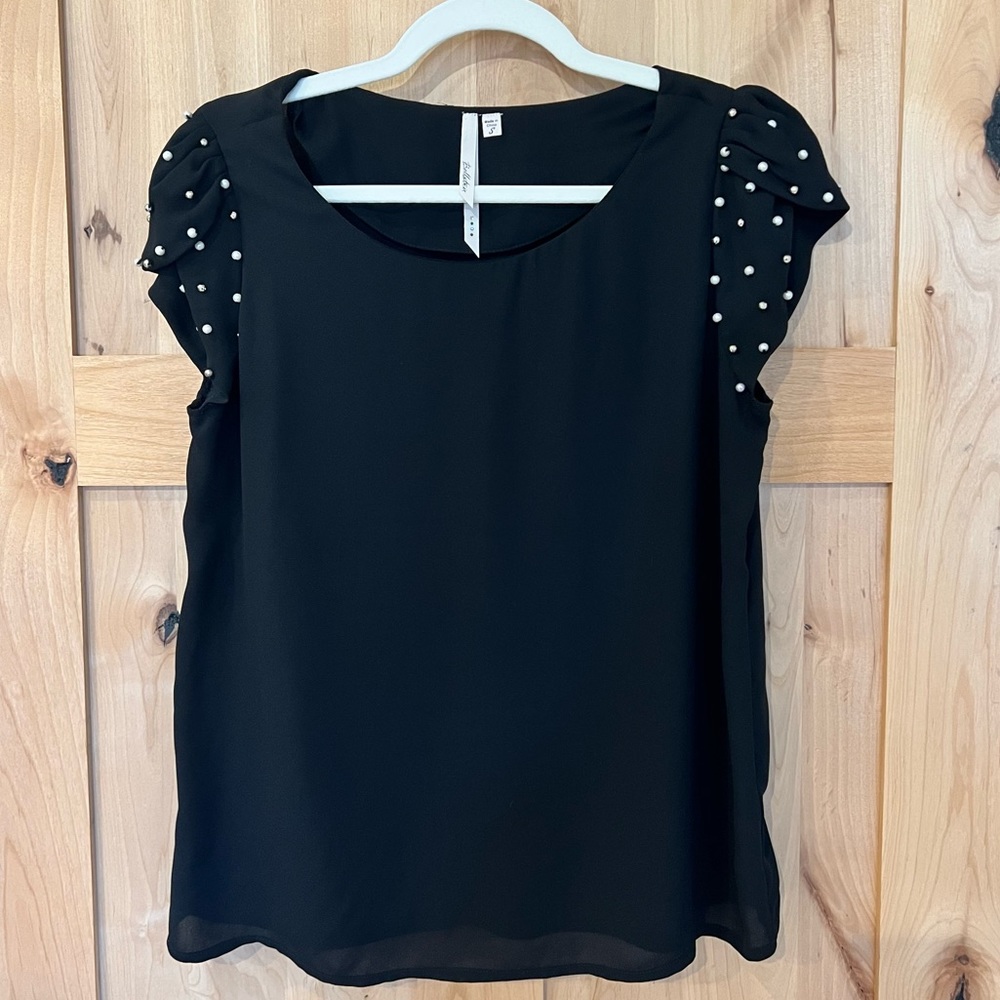 Black top with pearl shoulder details, S